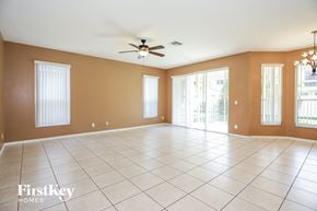 Miramar house for rent - an empty living room with a ceiling fan