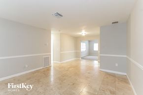 Clearwater house for rent - an empty living room and dining room in a house