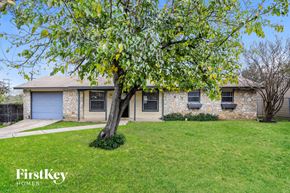 San Antonio house for rent - A house with a tree in front of it.
