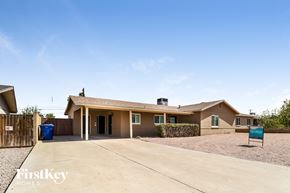 Mesa house for rent - A house with a sign that says FirstKey Homes.