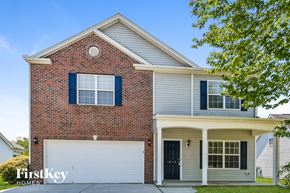 Kernersville house for rent - a brick house with a white garage door