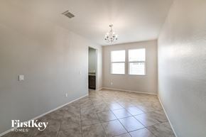 San Tan Valley house for rent - a empty living room with a window and tile floor