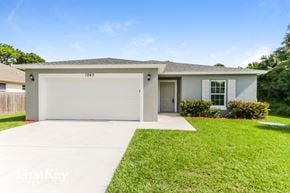 Port St. Lucie house for rent - a white house with a lawn and a garage door