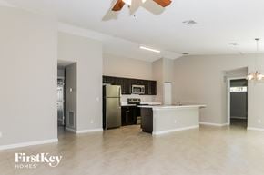 Port St. Lucie house for rent - a kitchen with a stainless steel refrigerator and a counter top