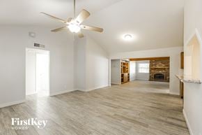 Phoenix house for rent - the living room and dining room are open to the kitchen and living room
