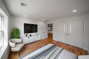Paterson apartment for rent - a white living room with a bed and a television
