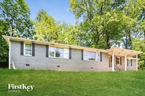 Smyrna house for rent - A house with a lawn in front of it.