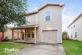 Cypress house for rent - A two-story house with a garage is for sale.