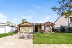 Humble house for rent - a house with a driveway and a lawn