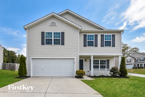 Whitsett house for rent - A two-story house with a garage is for sale by FirstKey Homes.