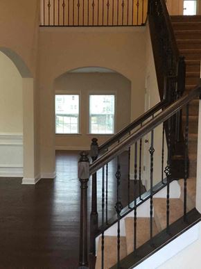 Davidson house for rent - a view of a staircase in a house from the bottom of the stairs