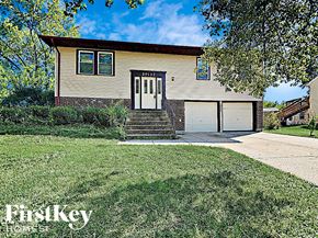 Frankfort house for rent - the front of a house with a lawn and a driveway