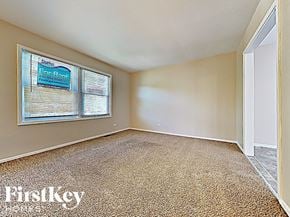Frankfort house for rent - an empty living room with a large window