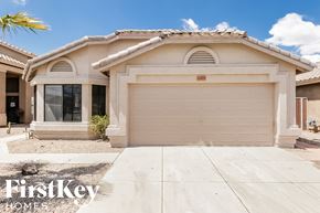Glendale house for rent - a single story home with a white garage door