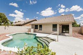 Glendale house for rent - a pool in front of a house with a pool
