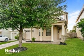 Humble house for rent - a home with a tree in the front yard