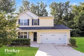 Greensboro house for rent - A two-story house with a garage is for sale by FirstKey Homes.