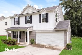 Greensboro house for rent - A two-story house with a garage is for sale.