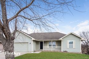 Kearney house for rent - a house with a tree in front of it