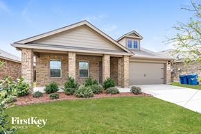 Forney house for rent - a home with a lawn and a driveway