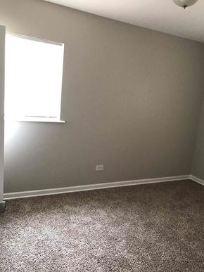 Richton Park house for rent - a room with a carpet and a window