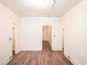 Bellingham apartment for rent - A long, narrow room with wooden floors and white walls.