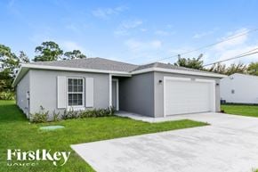 Port St. Lucie house for rent - A two-car garage with a house attached is for sale.