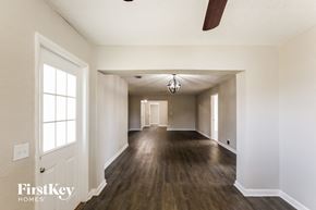 Hollywood house for rent - the living room and dining room of an empty house