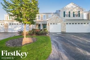 Plainfield house for rent - a house with a tree in the front yard