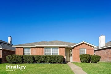 Lancaster house for rent - a house with a yard and a blue sky