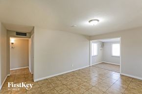 Phoenix house for rent - the spacious living room and dining room with tile flooring