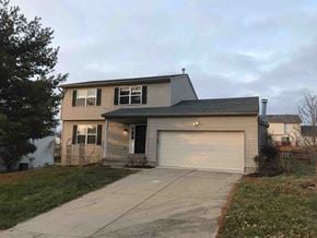 Fairfield house for rent - a house with a driveway and a garage door