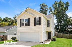 Raleigh house for rent - A two-story house with a garage is for sale.