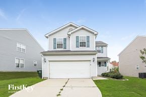 Raleigh house for rent - a white house with a white garage door