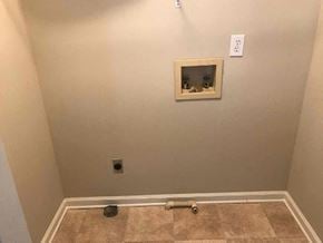 Lawrenceville house for rent - a empty room with a wall with a hole