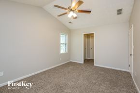 Marietta house for rent - the master bedroom is spacious and has a ceiling fan