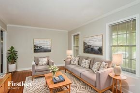 Memphis house for rent - A living room with a couch, chair, and coffee table.