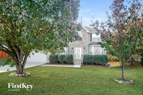 Douglasville house for rent - a large lawn in front of a house with a white door