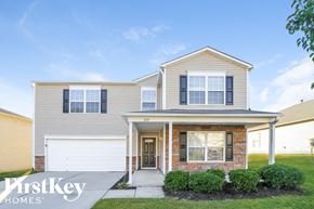 Winston-Salem house for rent - A two-story house with a garage is for sale.
