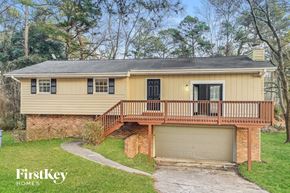 Dacula house for rent - A house with a garage and a balcony is for sale.