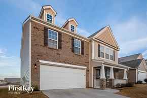 Concord house for rent - A two-story house with a garage is for sale by FirstKey Homes.
