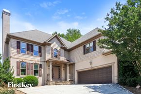Dacula house for rent - A house with a garage and a driveway is for sale.