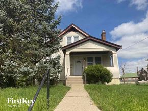 Cincinnati house for rent - an old house with a sidewalk in front of it