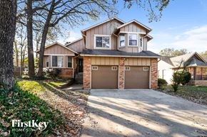 Arlington house for rent - the front of a house with a garage and a driveway