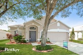 Land O'lakes house for rent - a house with a tree in front of it