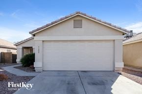 Glendale house for rent - a white garage door in front of a house