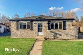 Midlothian house for rent - a small brick house with a sidewalk in front of it