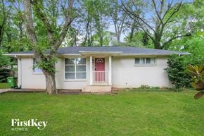 Decatur house for rent - a small white house with a red door