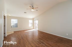 San Tan Valley house for rent - a living room with wood floors and a ceiling fan