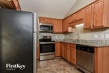 Greensboro house for rent - full kitchen with stainless steel appliances and granite counter tops